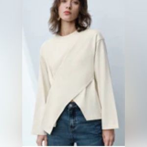 NWT. Urban Revivo Asymmetric Crew Neck Blouse.